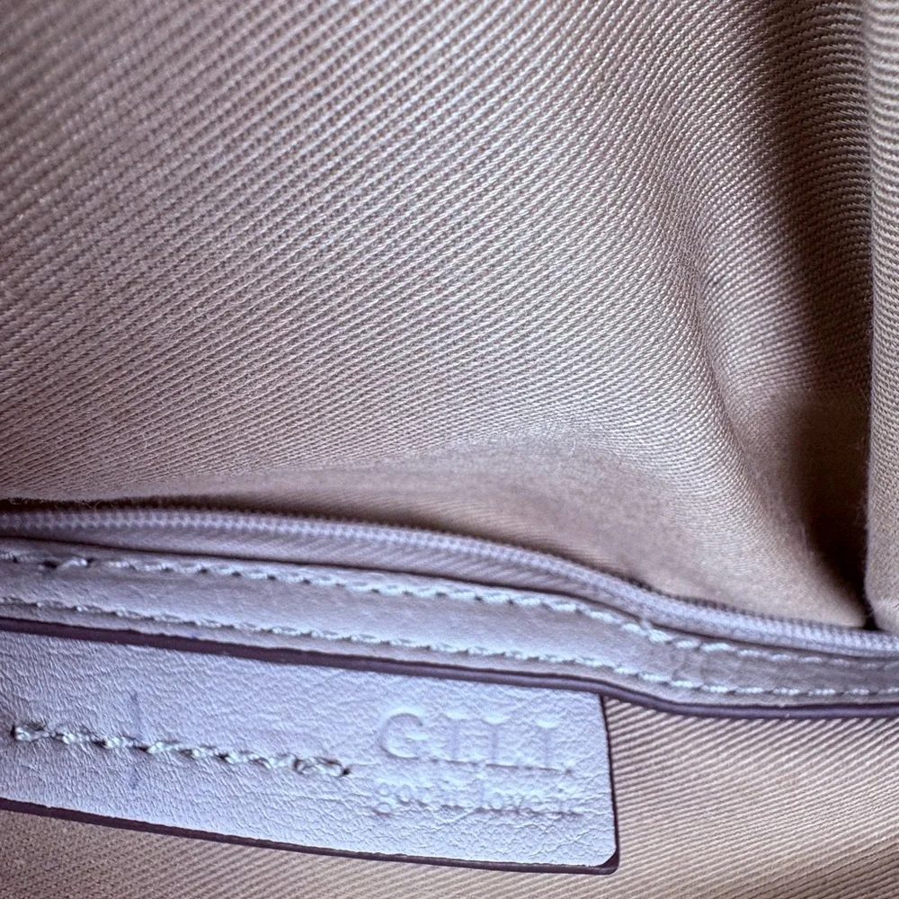 G.I.L.I. Got It. Love It. White Pebbled Leather Drawstring Hobo Tassel